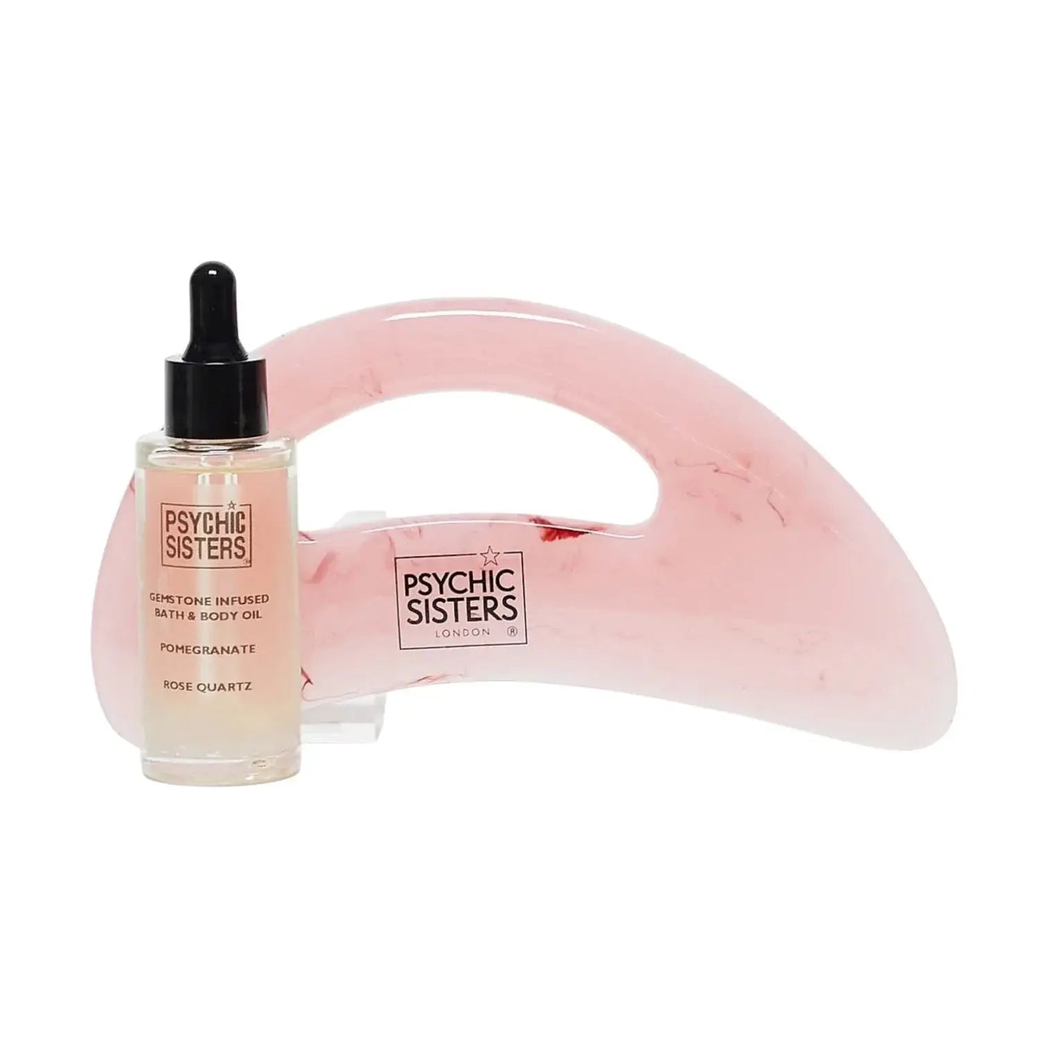 Psychic Sisters self-care product bundles featuring gemstone infused bath and body oil and pink scoop.