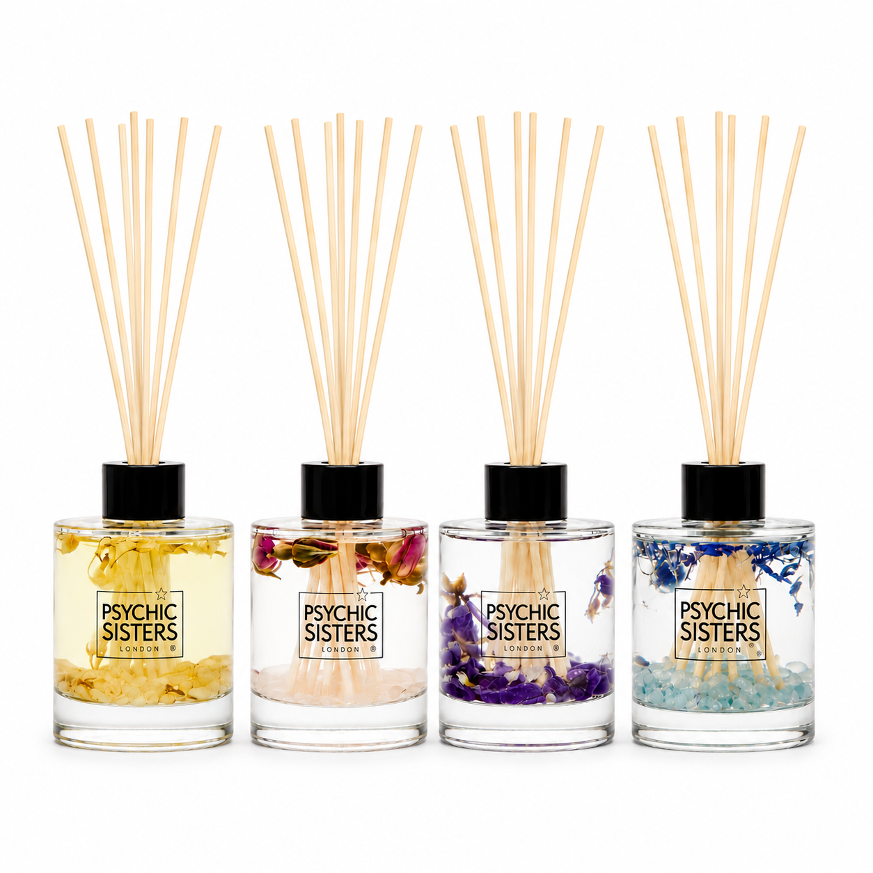 Gemstone infused reed diffuser trio from Psychic Sisters, featuring calming fragrances and beautiful design.