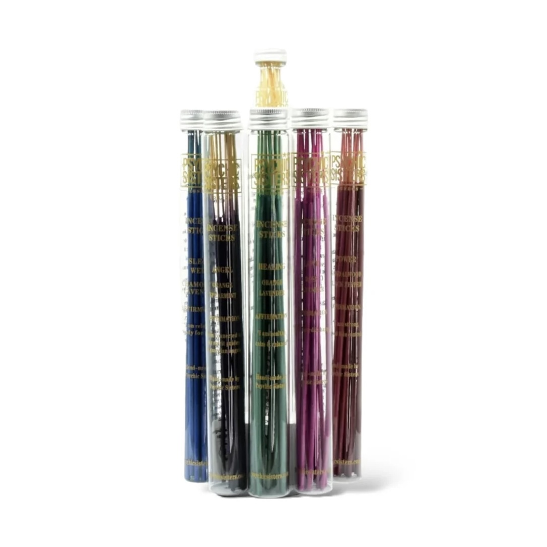 Collection of aromatic incense sticks in colorful tubes, ideal for enhancing relaxation and meditation.