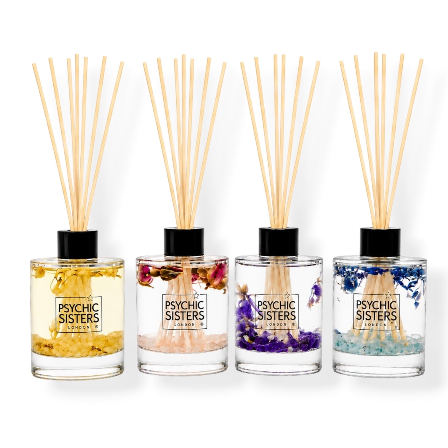 Gemstone infused reed diffuser trio from Psychic Sisters, featuring calming fragrances and beautiful design.