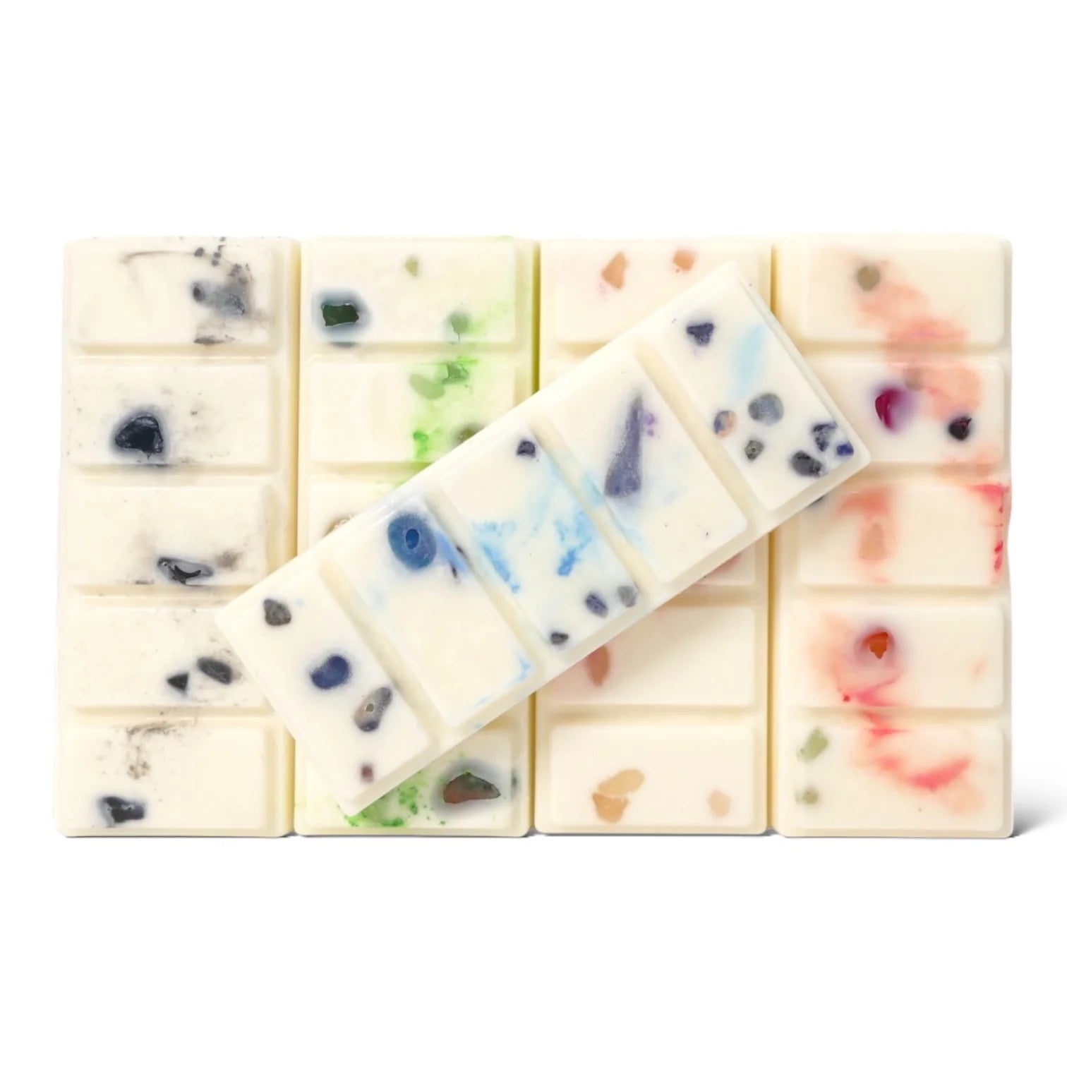 Collection of beautiful crystal infused wax melts with vibrant colors and embedded gemstones.