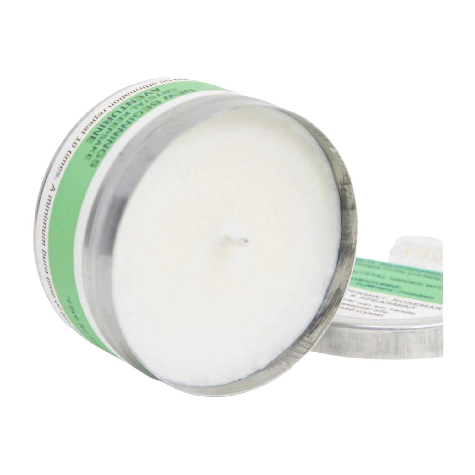 New Beginnings Tin Candle in a silver tin with green accents and a white soy wax interior.