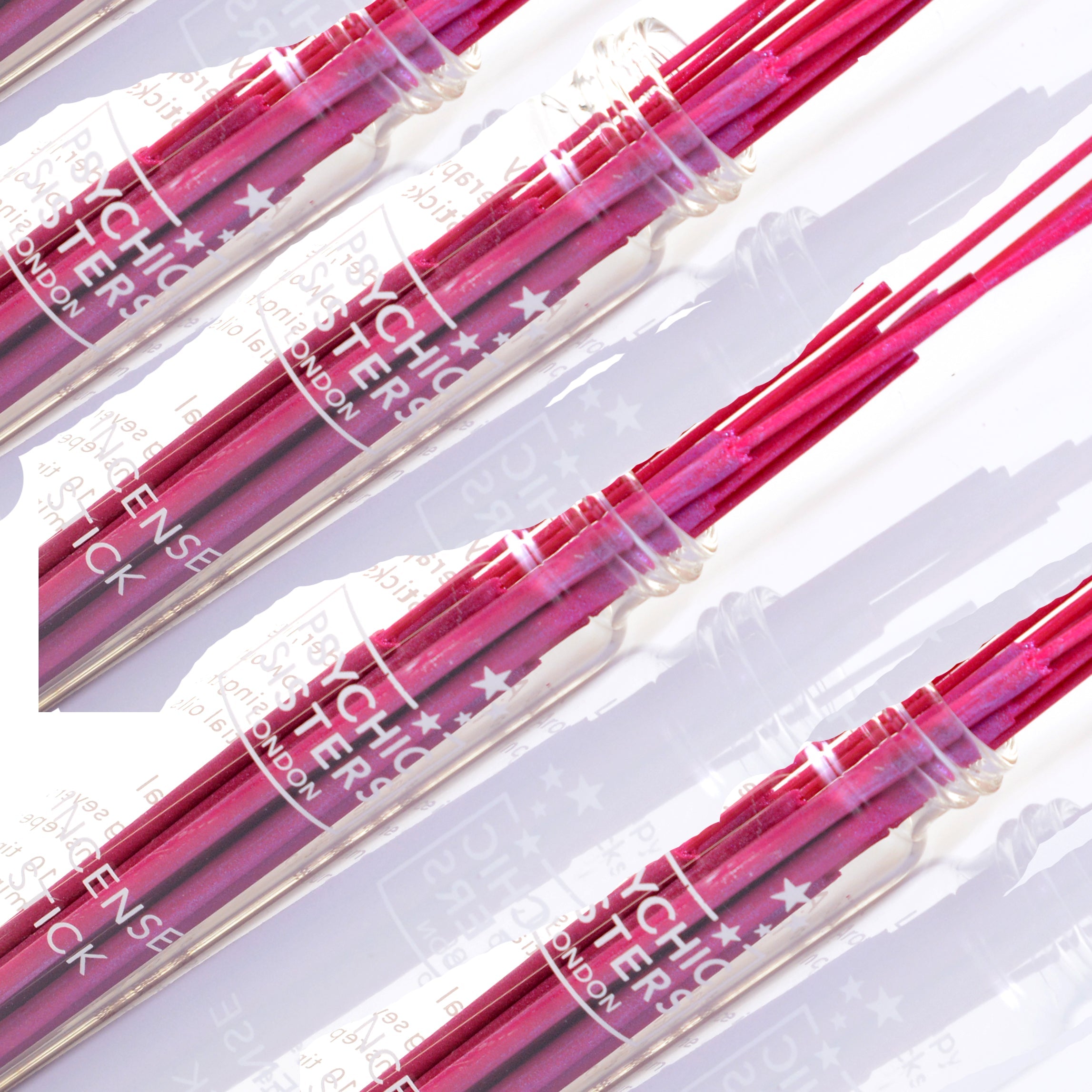 Love Incense sticks displayed in a recyclable glass tube, handmade with pure essential oils, vegan and cruelty-free.