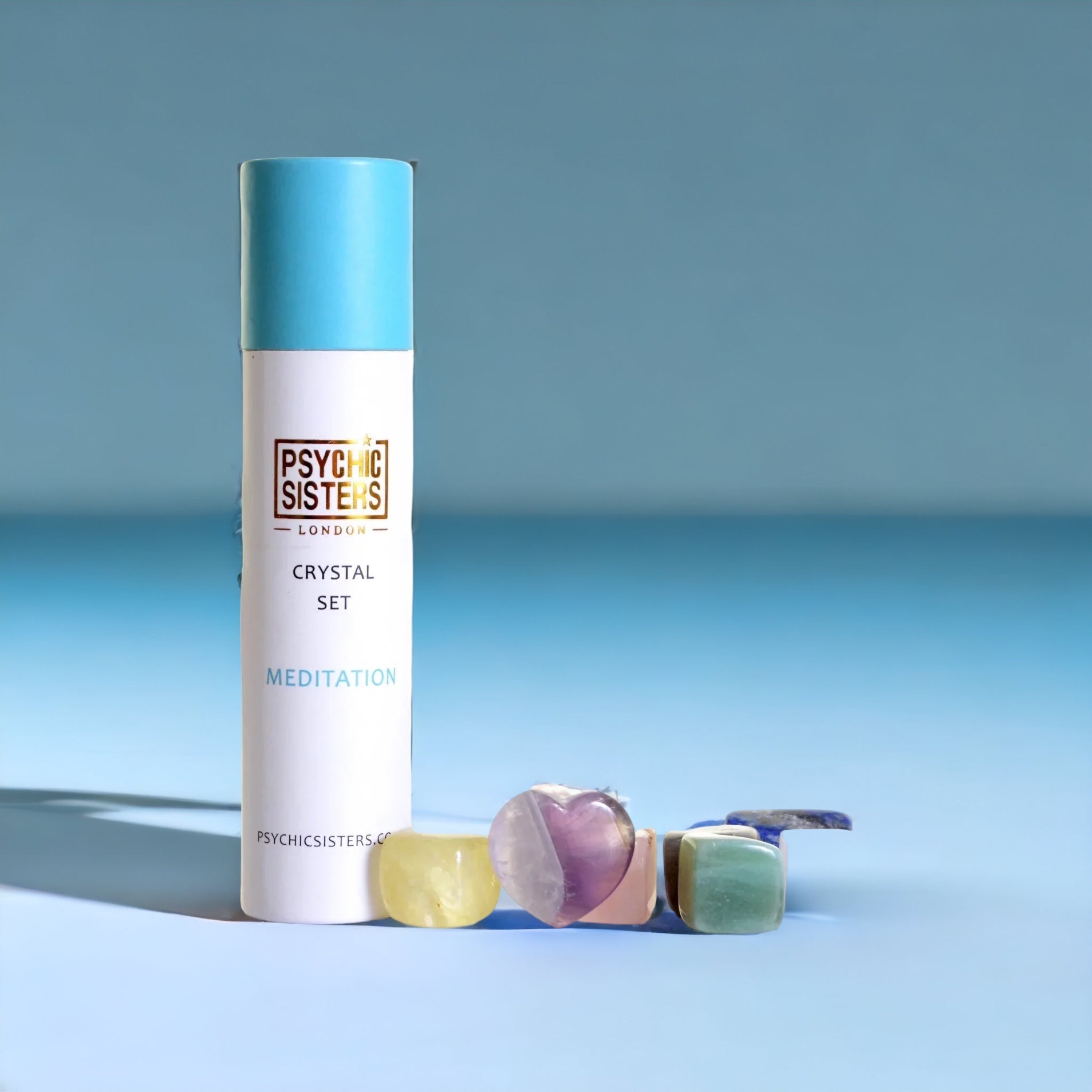 Meditation Crystal Set featuring colored stones and packaging designed for enhancing mindfulness and meditation practices.
