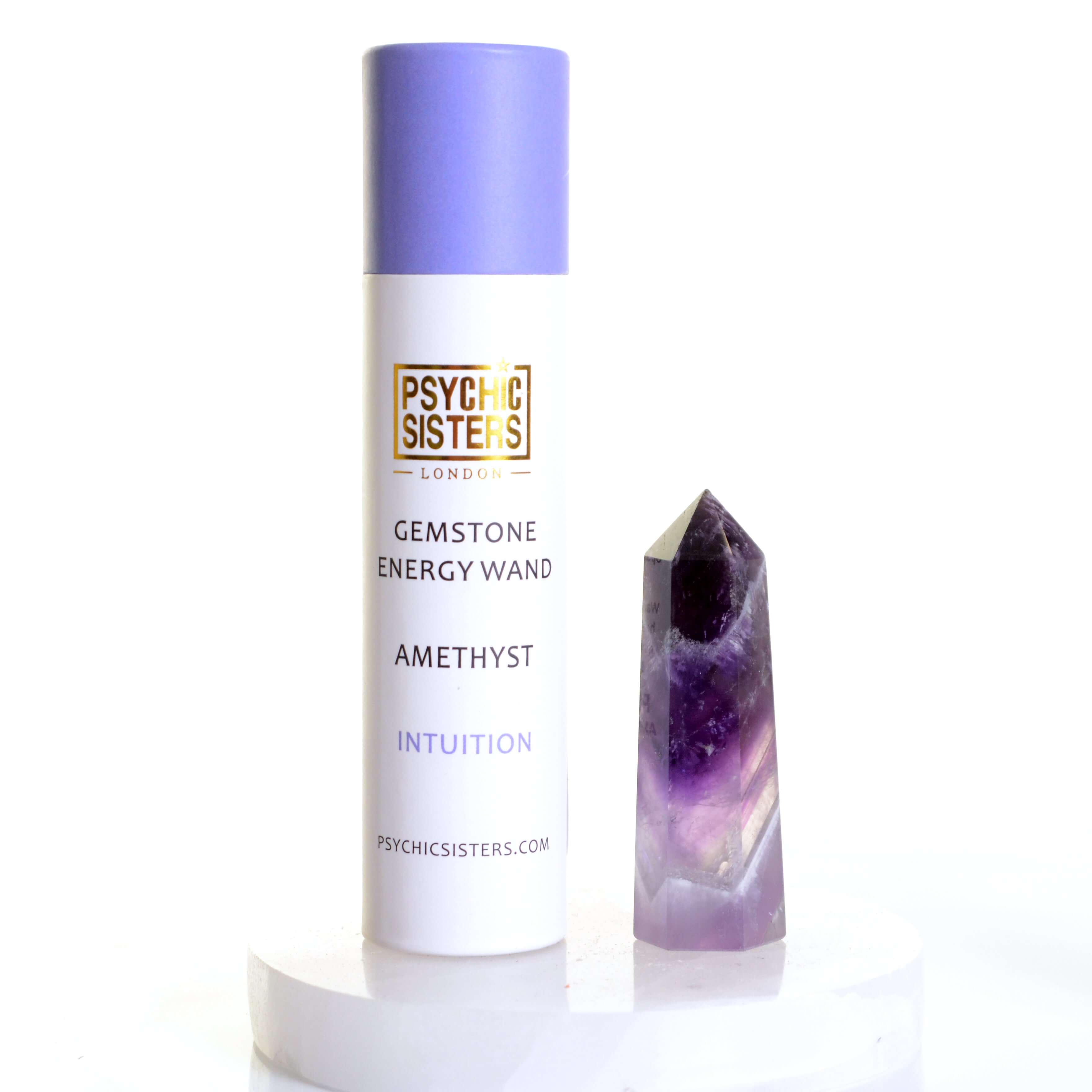 Amethyst Point gemstone energy wand next to its packaging, enhancing intuition and spiritual awareness.