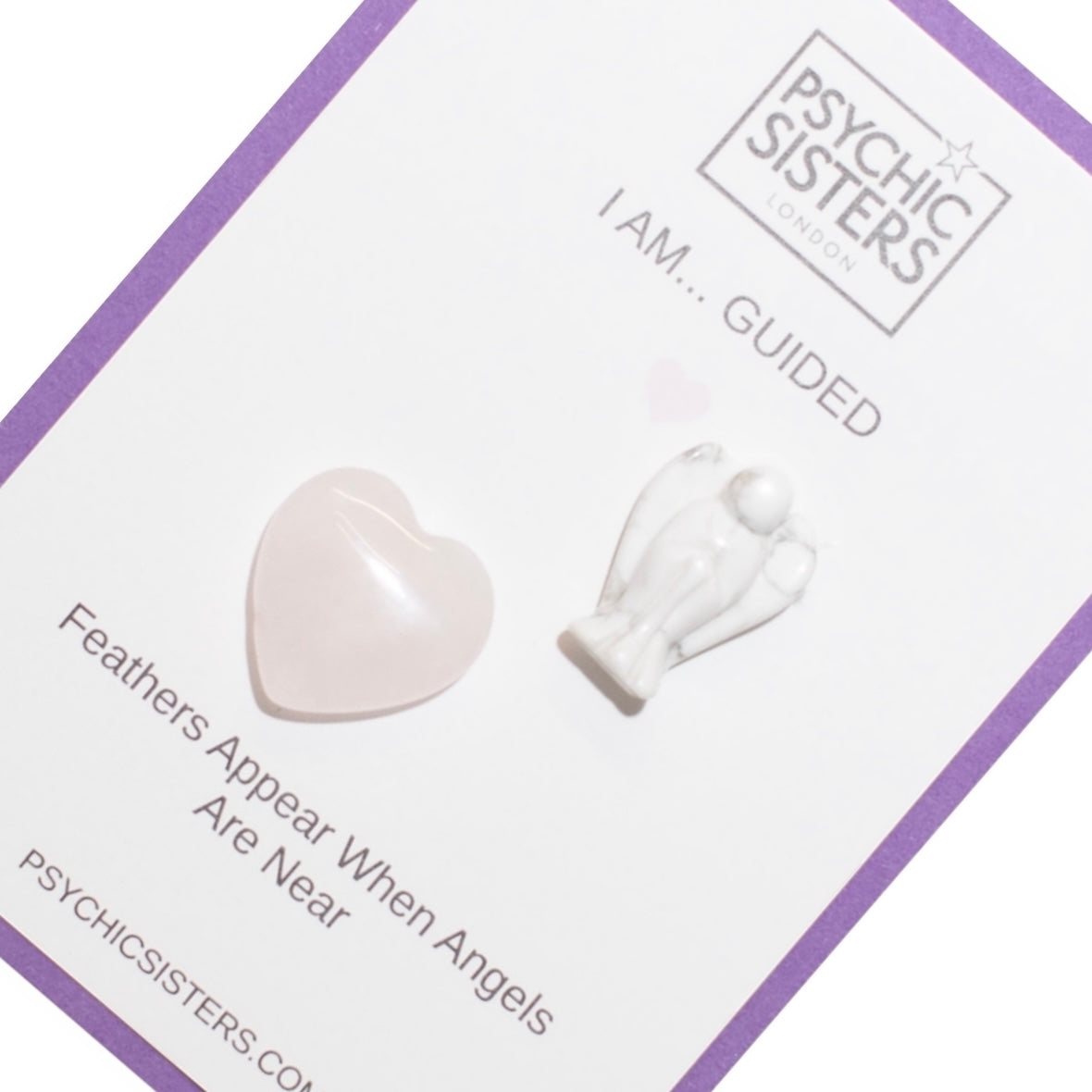 I Am Guided Hand-Chosen Crystal Card featuring a heart-shaped gemstone and an angel figurine.