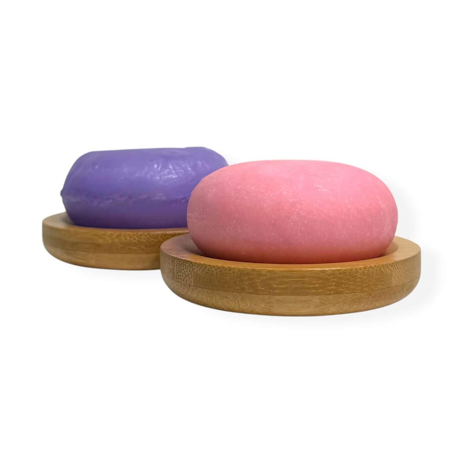 Vegan Hair Care Set – Eco-Friendly, Nourishing, and Plastic-Free Bars, featuring purple shampoo bar and pink conditioner bar.