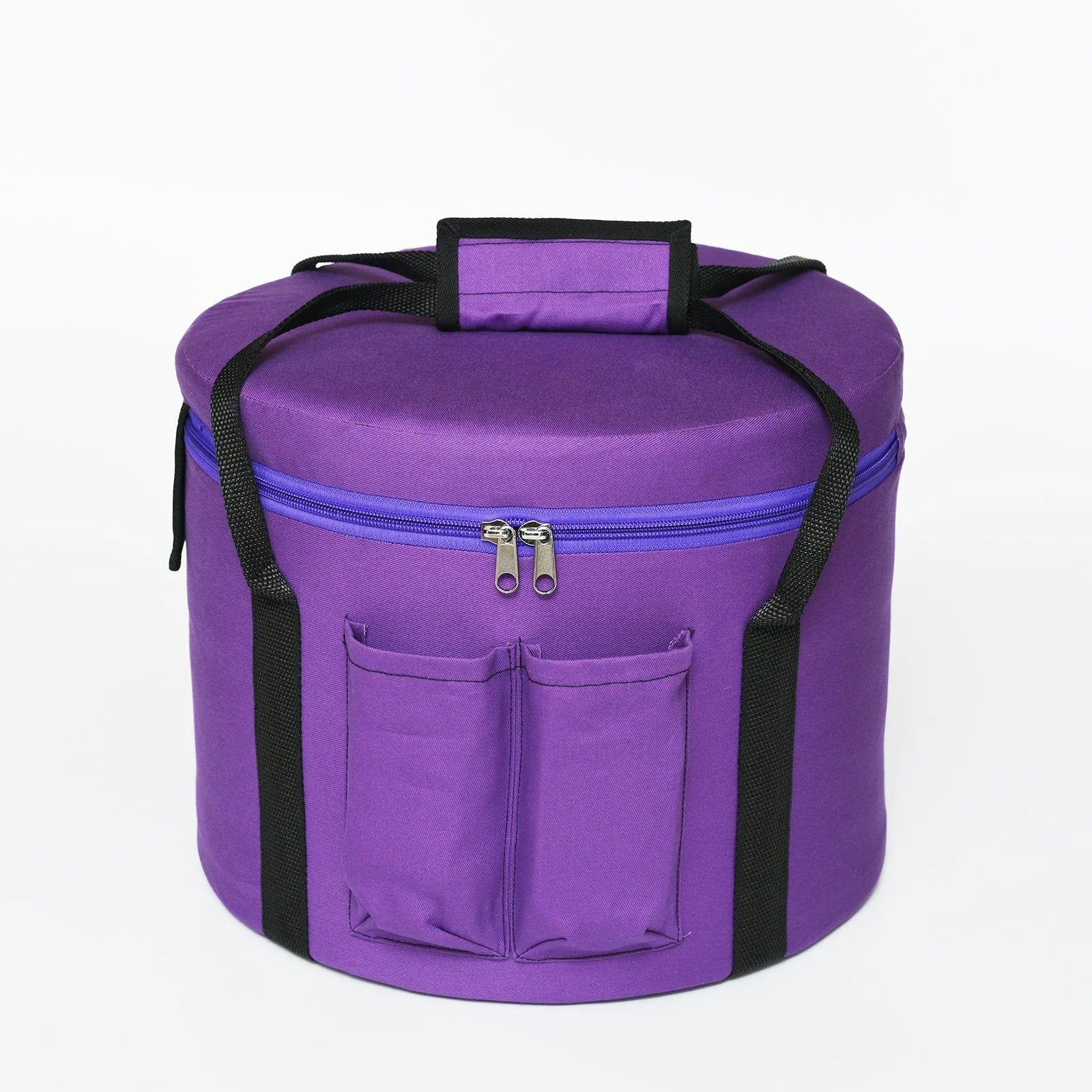 Purple round carrying bag with zipper and side pockets for storage.
