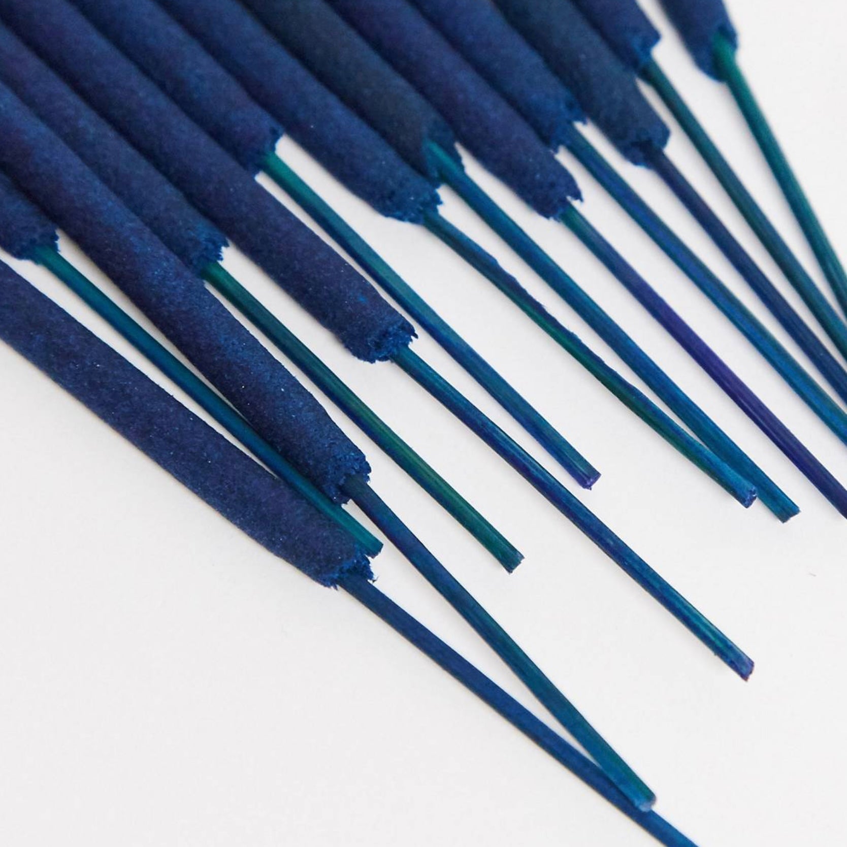 Sleep Well Incense sticks in shades of blue, handmade with pure essential oils for relaxation and ambiance.