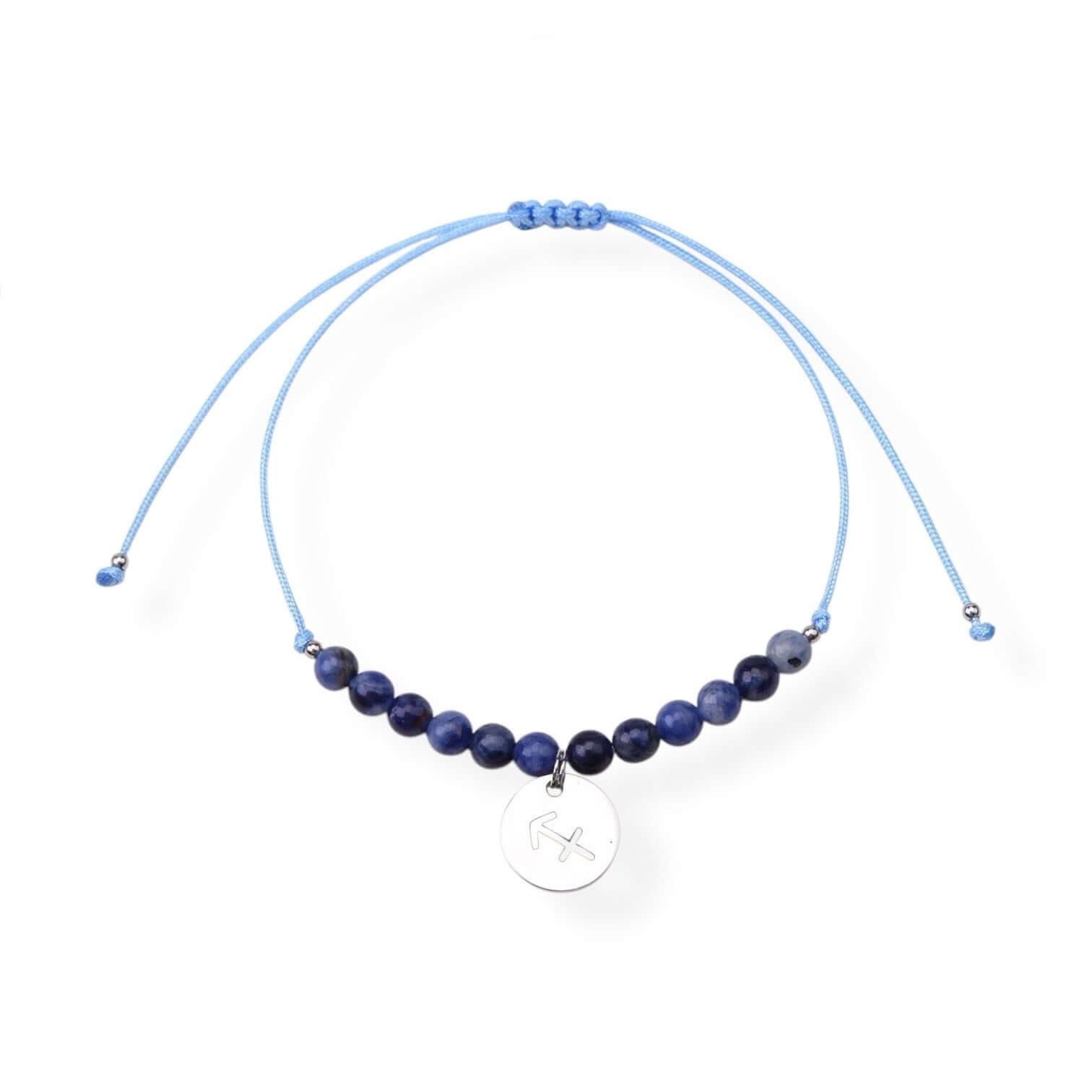 Sagittarius birthstone bracelet featuring Sodalite beads and charm on an adjustable blue cord.