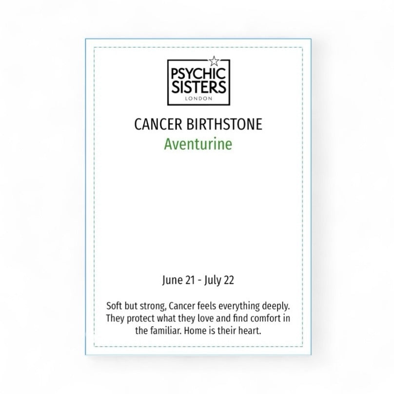 Card with Psychic Sisters branding and information about Cancer birthstone and characteristics.