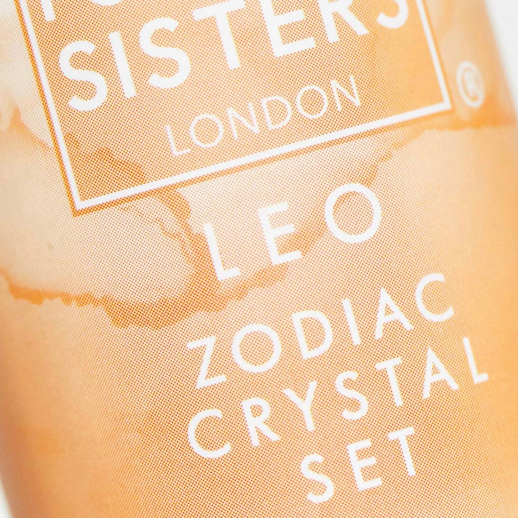 Leo Crystal Set (November 22 - December 21) packaging by Psychic Sisters, featuring Leo Zodiac Crystal Set.