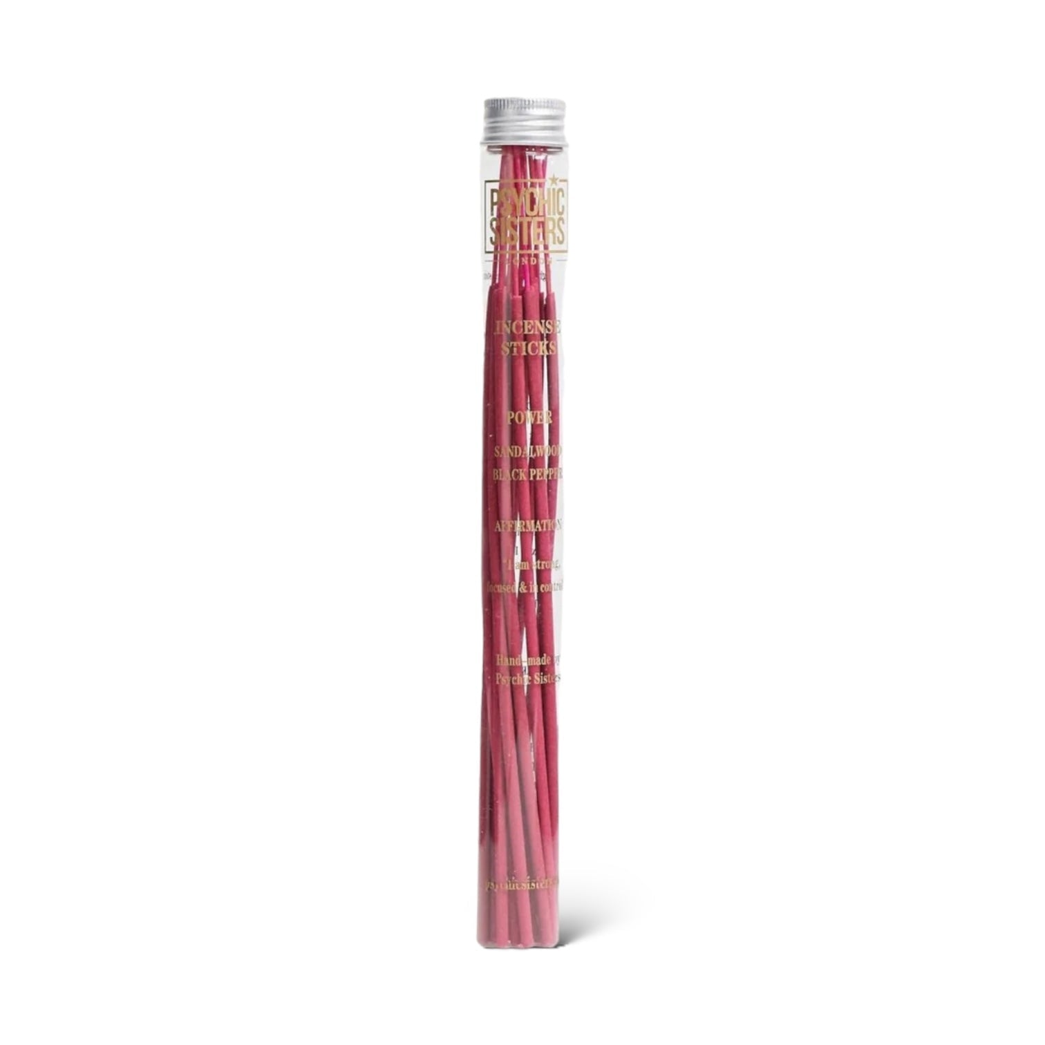 A clear cylindrical tube containing red incense sticks with black and gold labeling.
