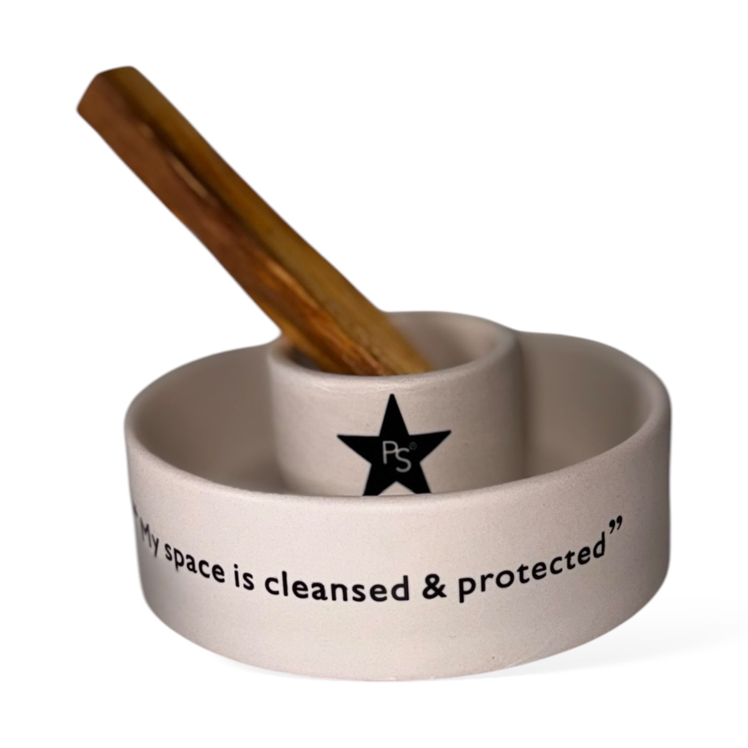 Sage And Palo Santo Ritual Set featuring a ceramic holder with the text 'My space is cleansed & protected' and a palo santo stick.
