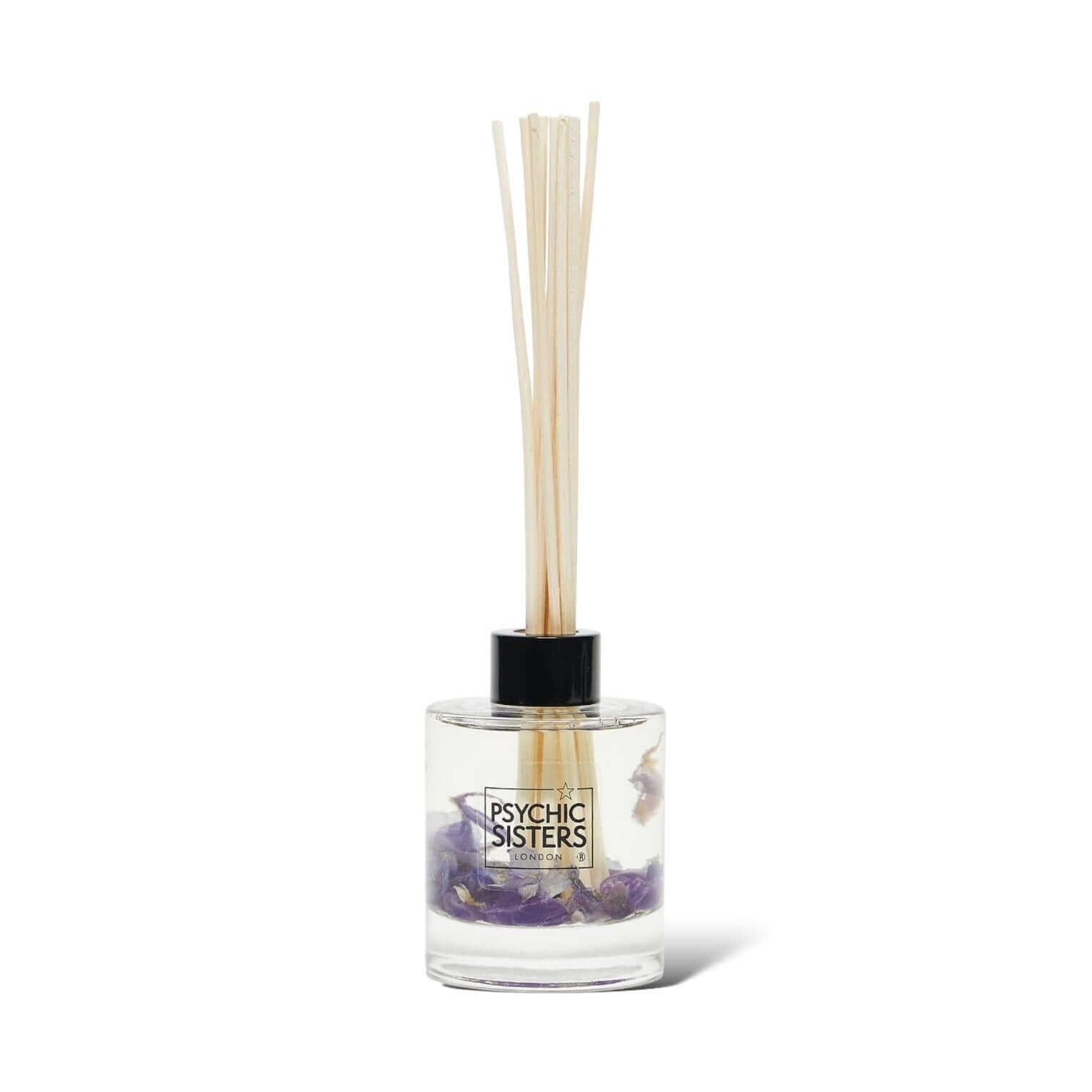 Amethyst infused reed diffuser by Psychic Sisters with natural amethyst crystals for soothing fragrance and serenity.