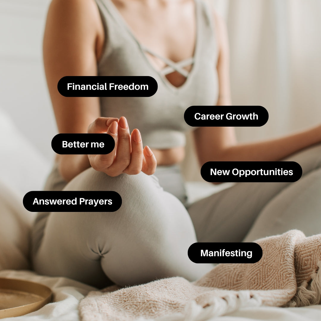 Person meditating with words floating: Financial Freedom, Career Growth, Better me, New Opportunities, Answered Prayers, Manifesting.