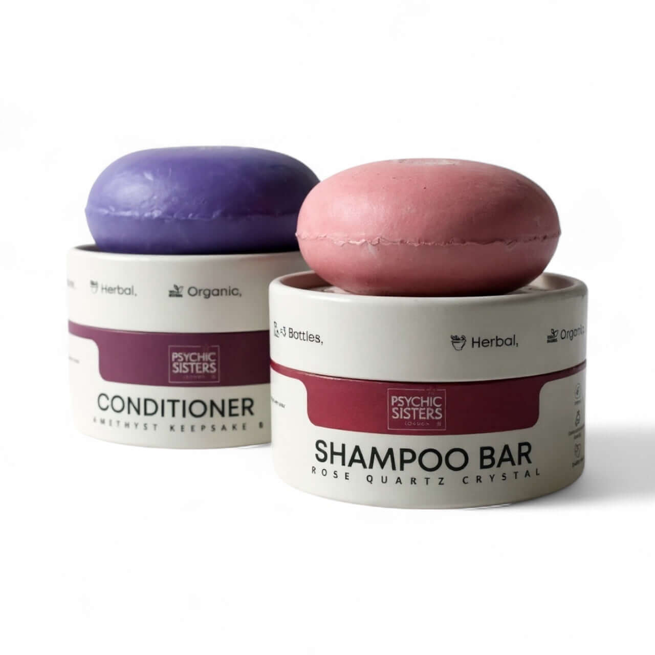 Vegan hair care set featuring Psychic Sisters shampoo bar and conditioner bar in eco-friendly packaging.