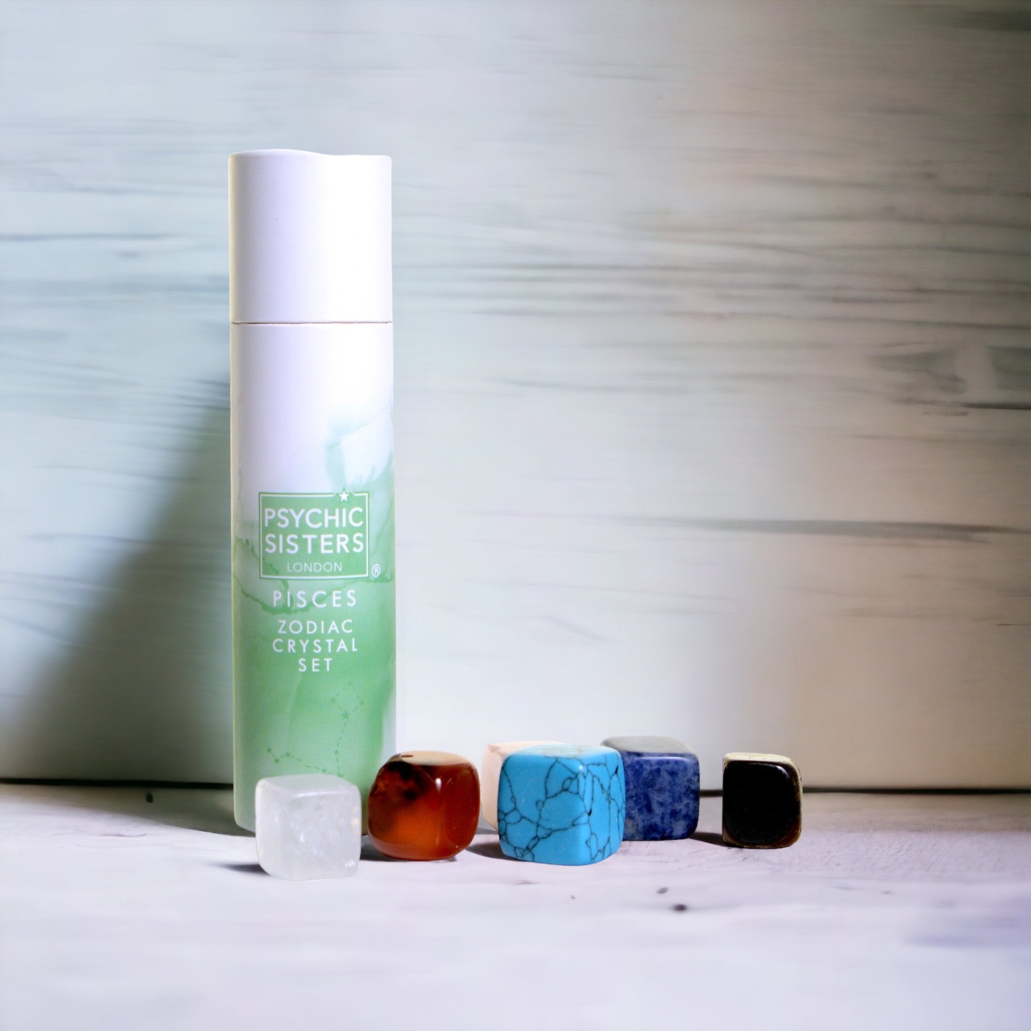 Pisces Crystal Set (February 19 – March 20) by Psychic Sisters with assorted crystals in packaging.