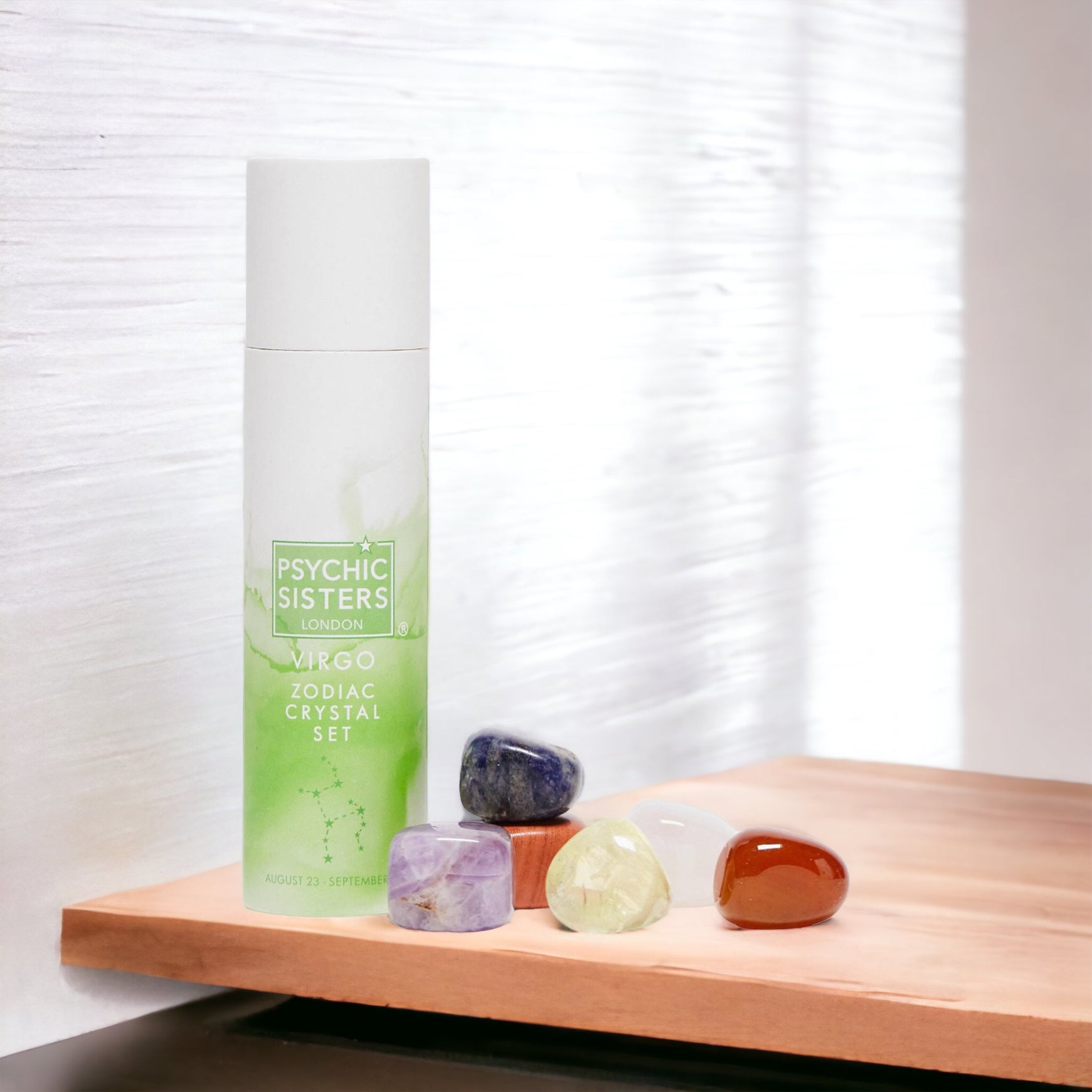 Virgo Crystal Set (August 23 - September 22) by Psychic Sisters with assorted crystals on wooden surface.