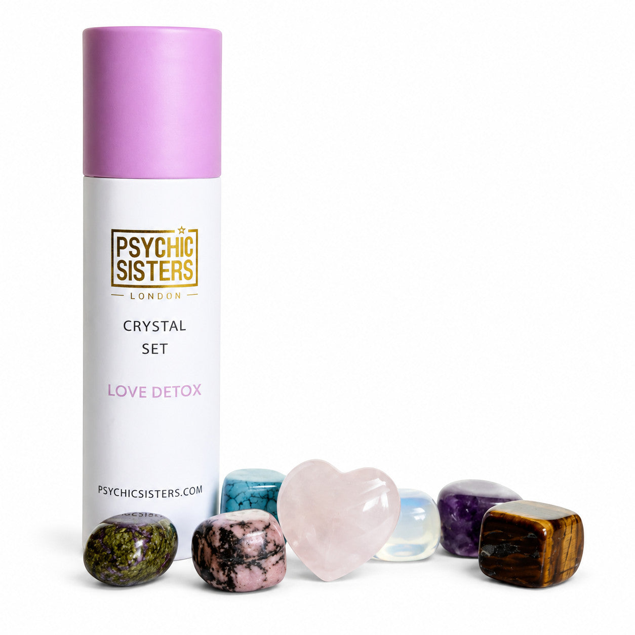 Psychic Sisters Love Detox crystal set featuring seven assorted tumbled stones and a heart-shaped rose quartz crystal.