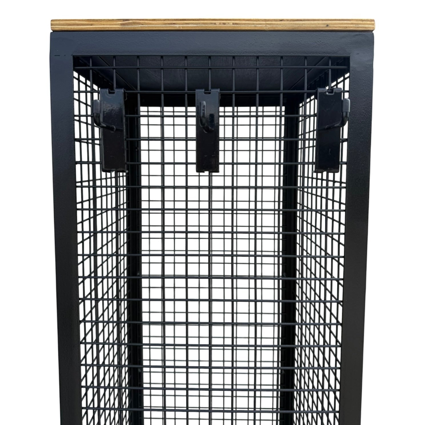 Psychic Sisters 4-sided rotating black mesh spinner display stand with a wooden top and metal hooks for retail use.